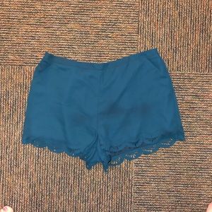 Dye cut scalloped teal shorts